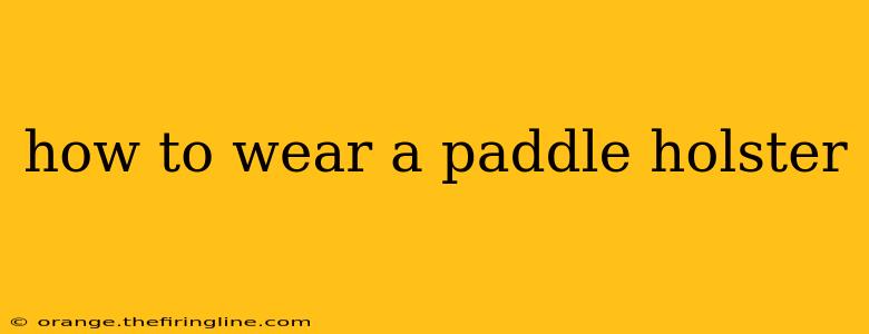 how to wear a paddle holster